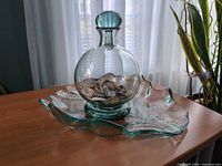 platter with vase and stopper displayed together