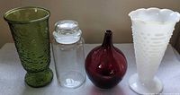 Group shot of four glass vases
