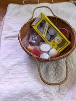 Basket with candles and tealight box inside