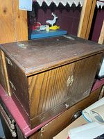 Front view of wooden chemist box closed