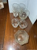 Group shot of all Cornflower etched glass pieces