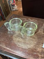 Both Gaylord glass shaving mugs side by side on tabletop