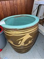 Full view of front showing motif and exterior glaze