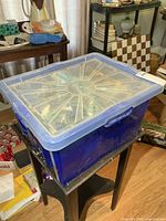 Closed blue bin with clear lid