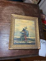 Front view of framed oil painting