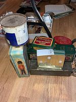 Stack of various tins showing sizes and designs