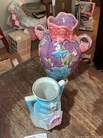 Both vases side by side showing size and color contrast.