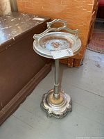 Full view of chrome pedestal ashtray stand