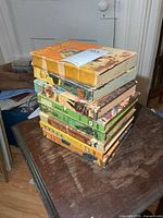 Stack of eight hardcover western TV books