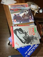Stack of assorted programs showing Daytona 500 and Labatt’s Grand Prix covers