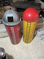 Front view of both silos showing color, grid pattern and domes