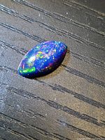 Top view of opal showing full multicolour play