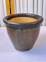 Side view showing glazed exterior finish of planter