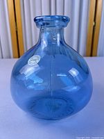 Front view of blue recycled glass vase