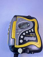 Front view of Sony WM-FS220 Sports Walkman showing controls, screen, branding