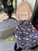 All three backpacks together displaying fronts