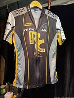 Front of cycling jersey showing zipper, graphics and colors