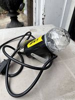 LED kaleidoscope projection light angled view showing dome lens and cable