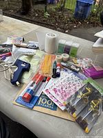 Overview of assorted arts and crafts supplies on table