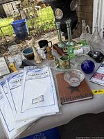 Overview showing assorted curios on table