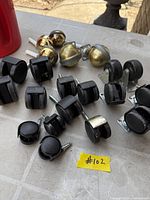 Group view of assorted casters on tabletop