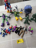 Full set of assorted action figures on tabletop