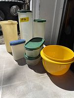 All seven vintage Tupperware pieces grouped together