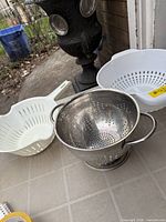 All three colanders grouped together