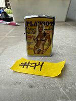 Front view of Playboy lighter standing upright