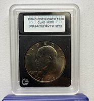 Front of INB slab showing obverse and label with grade MS70
