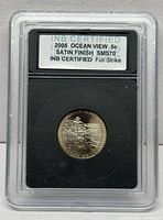 Encapsulated 2005-D Jefferson Nickel in INB holder showing label