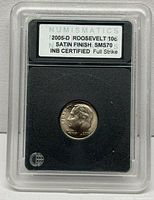 Front of slab showing label and obverse of dime
