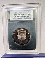 Slabbed coin front with INB certification label