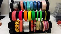 Three-tier stand showing full assortment of bangles