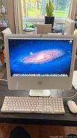 iMac front view with keyboard and mouse
