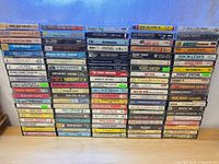 Front view of full cassette collection stacked in rows
