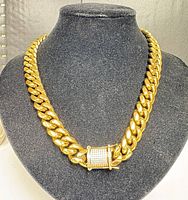 Full view of Cuban link chain on display bust