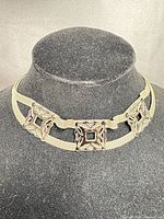 Choker displayed on bust showing overall design