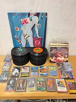 Overview of all items: LP, two stacks of 45s, sleeve singles, cassettes