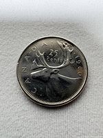 Reverse showing caribou design and 1960 date