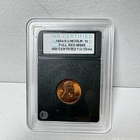 Front of INB slab showing 1954-S Lincoln Wheat Cent and certification label