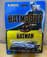 Front view of sealed 1989 Ertl Batmobile on original card