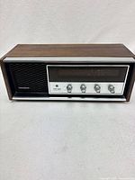 Front view of Panasonic RE-7369 radio showing speaker grille, dial and knobs