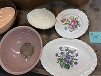 Group shot showing all bowls and decorative plates