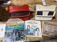 Red and cream View-Master viewers with Happy Days sleeve, booklet and mail-order form