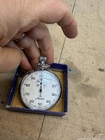 Minerva stopwatch front view in box