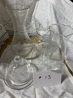 Group shot of the four clear etched glass items