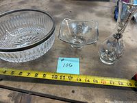 All three glass pieces side by side with measuring tape showing size