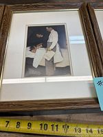 Freedom from Fear print in frame with measuring tape showing size