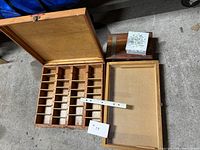 All three boxes shown open and closed with ruler for scale